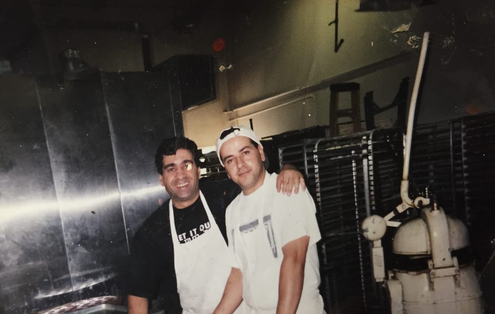 Two bakers at work in the M&J Bakery kitchen